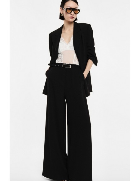 Pantalon palazzo noir taille haute ceinture métallique vue face – Imperial Femme